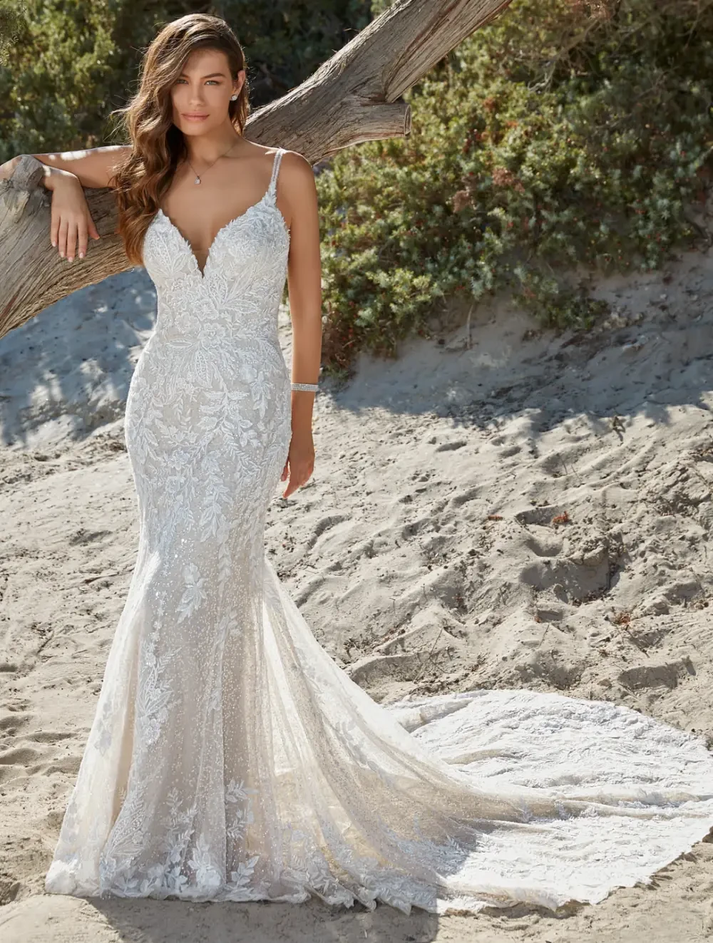 Model wearing a white  Eddy K Dress