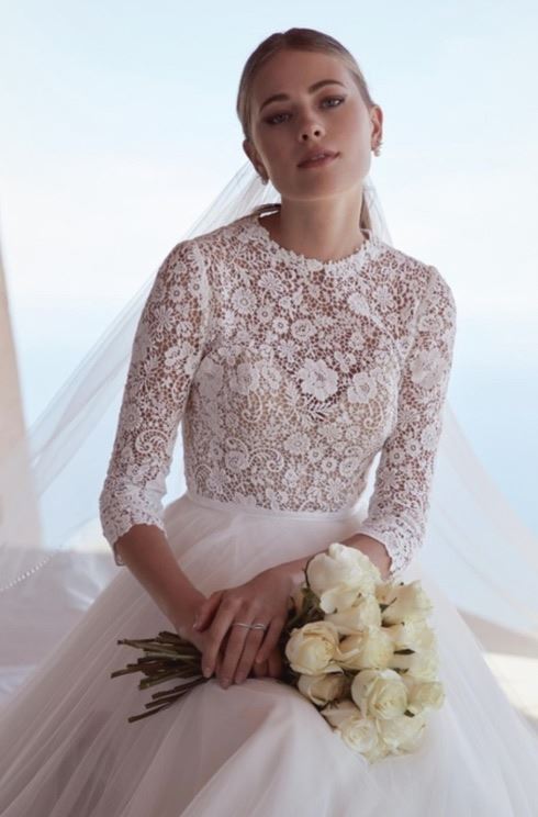 Model wearing a watters wedding Dress